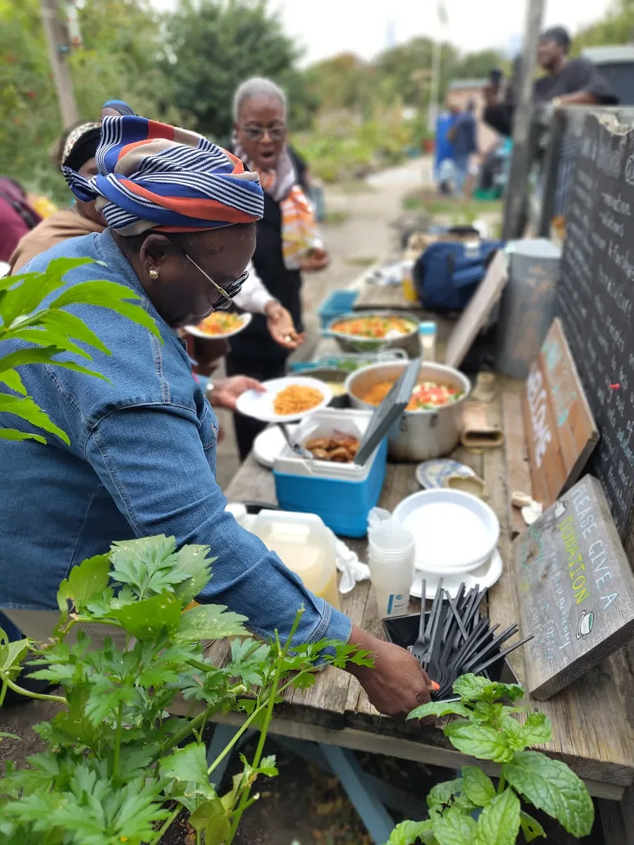 Cultural meal and nourishment table at the Soulful Places Wellbeing Festival in Glengall Wharf Garden. - ACHFN, African & Caribbean Heritage Food Network